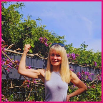 A person flexing her arm in front of a fence

AI-generated content may be incorrect.