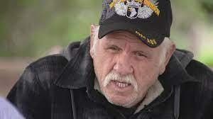 A person wearing a hat

Description automatically generated with medium confidence