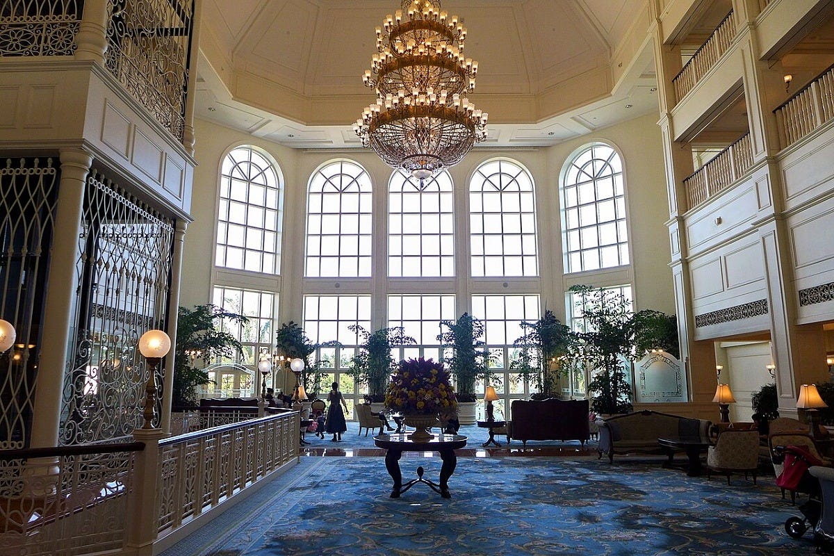 The Hong Kong Disneyland Hotel lobby in 2017. Image: Wpcpey via Wikimedia Commons The Hong Kong Disneyland Hotel lobby in 2017. Image: Wpcpey via Wikimedia Commons