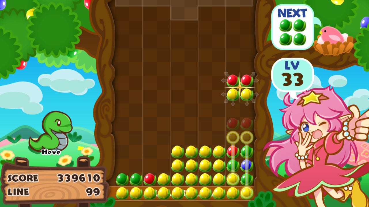 A screenshot from Soldam: Drop, Connect, Erase, where a piece with two red on top and two yellow beneath is about to sandwich various colors in between it and other yellow pieces, converting them all to yellow.