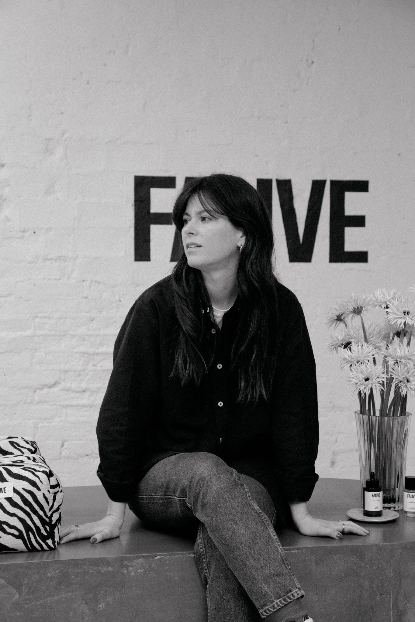Fauve co-founder seated inside the brand's Paris space Fauve co-founder seated inside the brand's Paris space