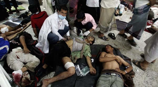 Protesters were treated at a makeshift hospital in Sana, Yemen. More than 20 people were killed in the worst violence since March. Protesters were treated at a makeshift hospital in Sana, Yemen. More than 20 people were killed in the worst violence since March.