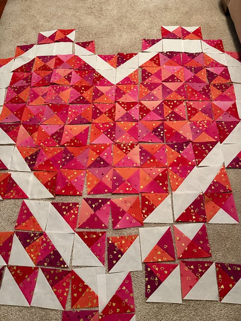 quilt blocks arranged before sewing