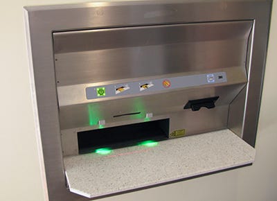 A computer that scans barcodes of books A computer that scans barcodes of books