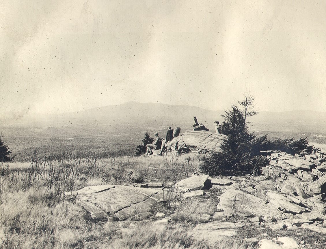 People on mountain summit
