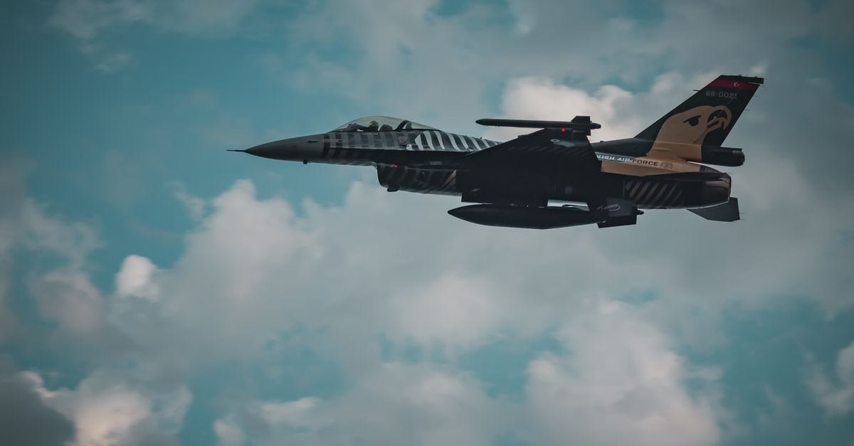 Photo: Cuma Ersöz / Pexels A Turkish Air Force jet soaring through a cloudy sky, capturing a moment of military aviation in action.