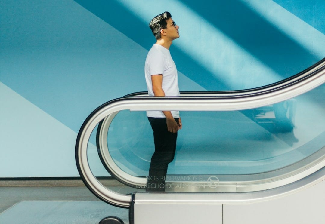 man standing on stairs