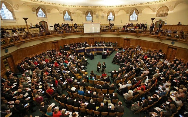 Members of the Synod listen to speeches Members of the Synod listen to speeches