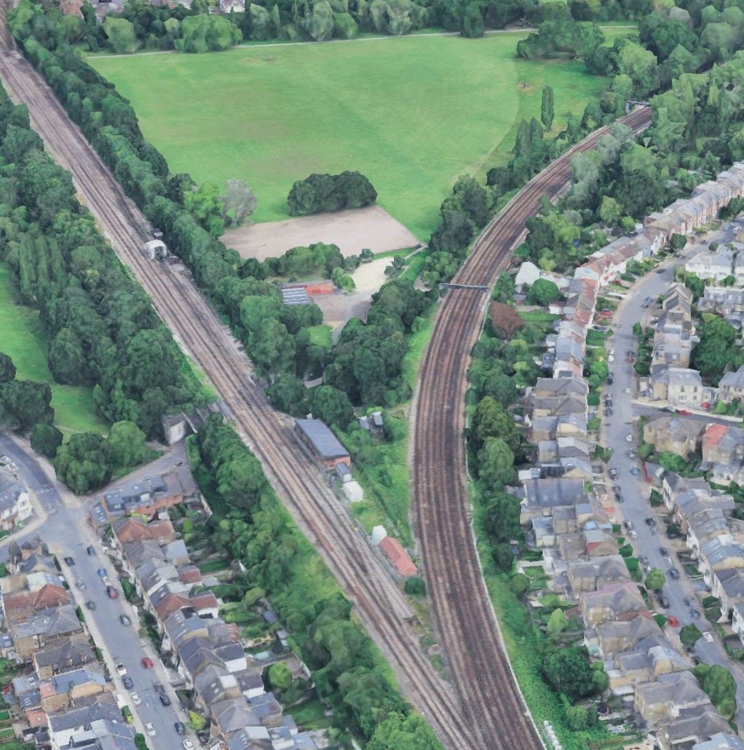 May be an image of train and railway