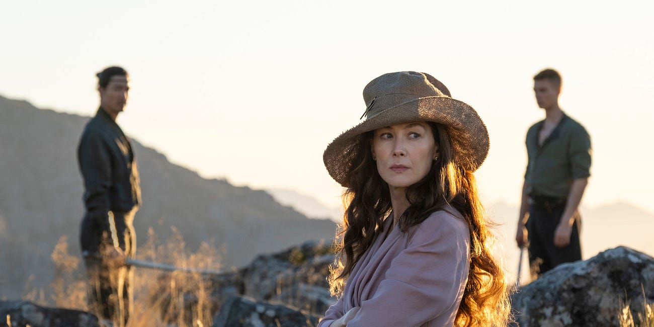 Rosamund Pike Claims 'Wheel Of Time' Was Canceled Due "To The Terrible Churn Factor"