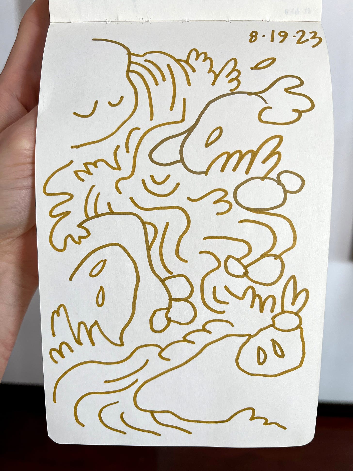 a loose drawing in gold pen of a burbling waterfall cascading over smooth stones a loose drawing in gold pen of a burbling waterfall cascading over smooth stones