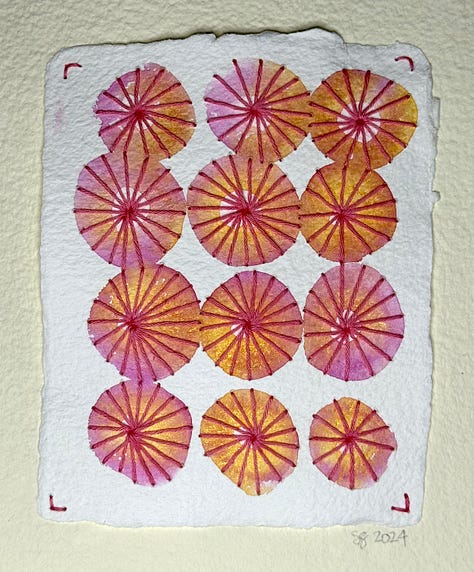 nine abstract paintings made with watercolor on cotton paper with Sashiko thread.