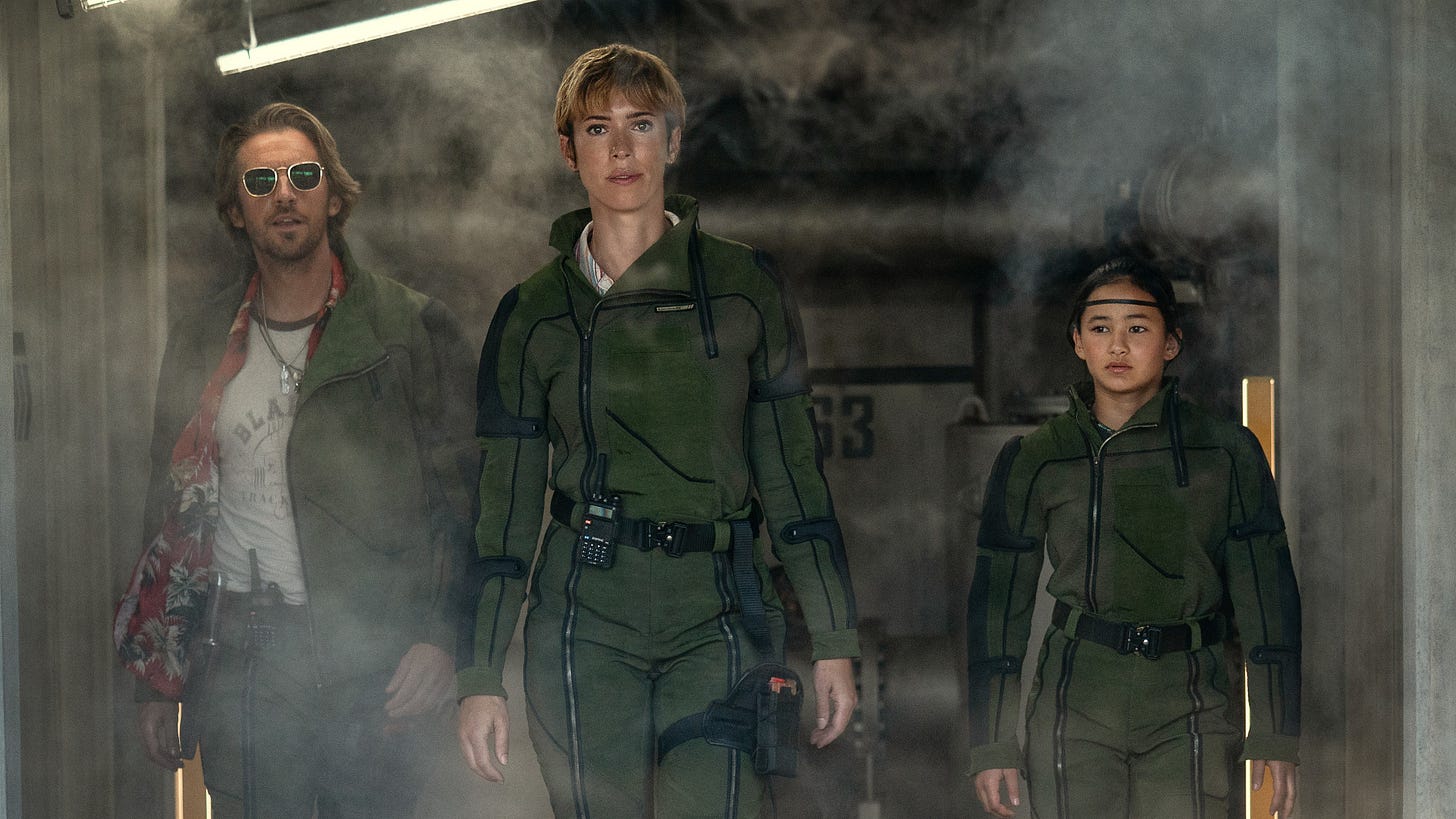 Dan Stevens, Rebecca Hall, and Kaylee Hottle in Godzilla x Kong