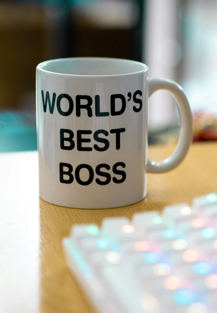 white mug on brown surface