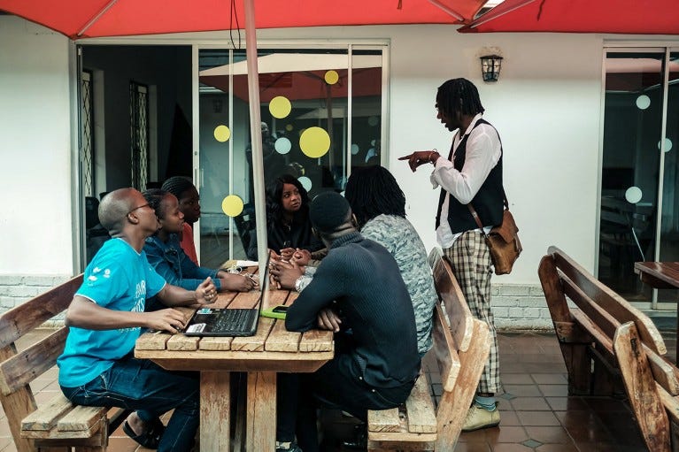 Dixon Chibanda, the founder and chief executive of Friendship Bench, speaks with some of his staff at his Harare offices in Zimbabwe. Dixon Chibanda, the founder and chief executive of Friendship Bench, speaks with some of his staff at his Harare offices in Zimbabwe.