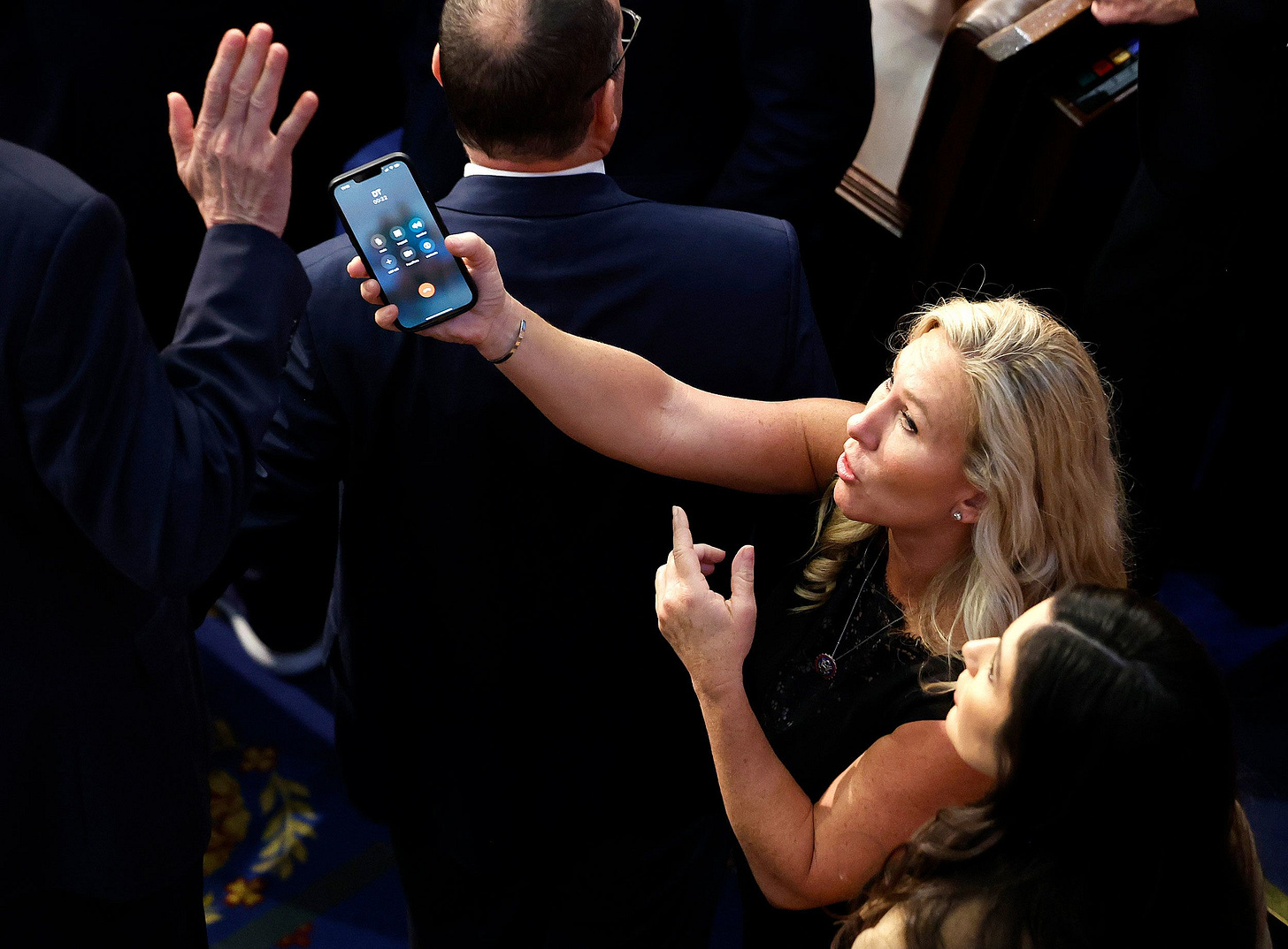 Marjorie Taylor Greene explains why she was on the phone with Trump on  House floor