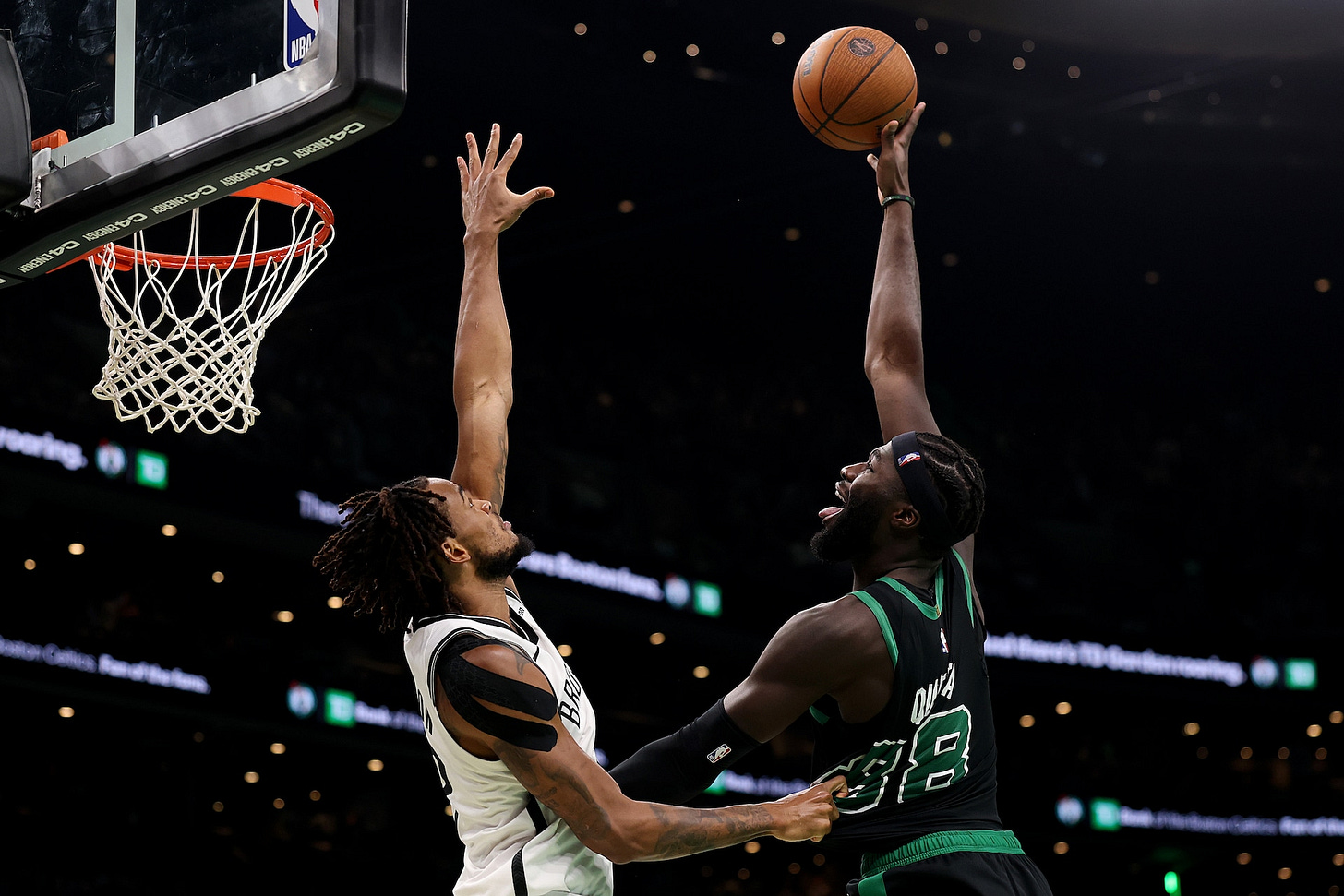 Slideshow-image: BOSTON, MASSACHUSETTS - NOVEMBER 21: Neemias Queta #88 of the Boston Celtics takes a shot against Nic Claxton #33 of the Brooklyn Nets during the s... Slideshow-image: BOSTON, MASSACHUSETTS - NOVEMBER 21: Neemias Queta #88 of the Boston Celtics takes a shot against Nic Claxton #33 of the Brooklyn Nets during the s...