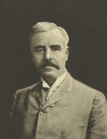 A person with a mustache

Description automatically generated