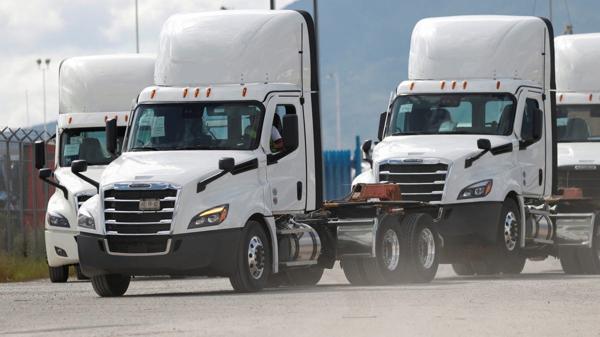 A worker drives a cargo truck at the Daimler Freightliner truck assembly plant, after U.S. President Donald Trump announced on Thursday that he would impose a 25% duty on imports of heavy-duty trucks starting October 1, in Derramadero, Coahuila state, Mexico, September 27, 2025.