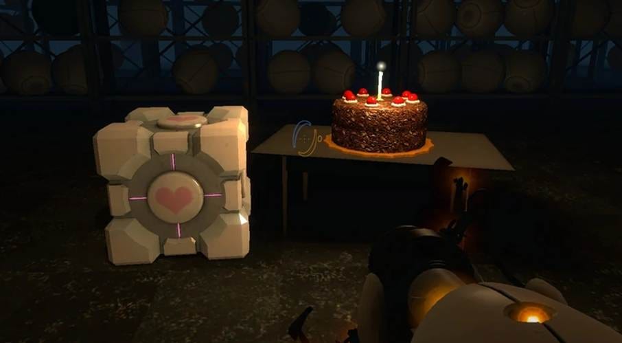 A person is holding a cake with a lit candle next to a metallic cube in a barrel-filled room.  AI-generated content may be incorrect.