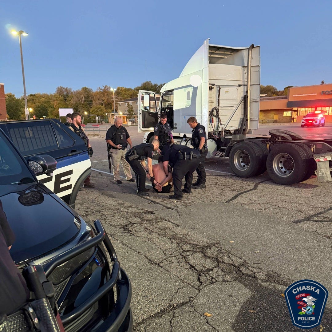 May be an image of ambulance and text