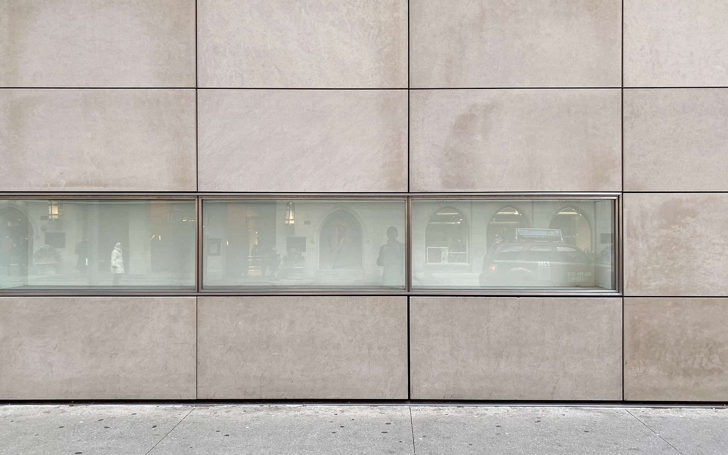 An empty graphic panel lightbox on the exterior of the former Apple North Michigan Avenue.