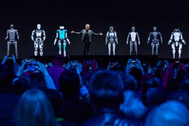 Jensen Huang, co-founder and chief executive officer of Nvidia Corp., center, during the Nvidia GPU Technology Conference in San Jose, California,...