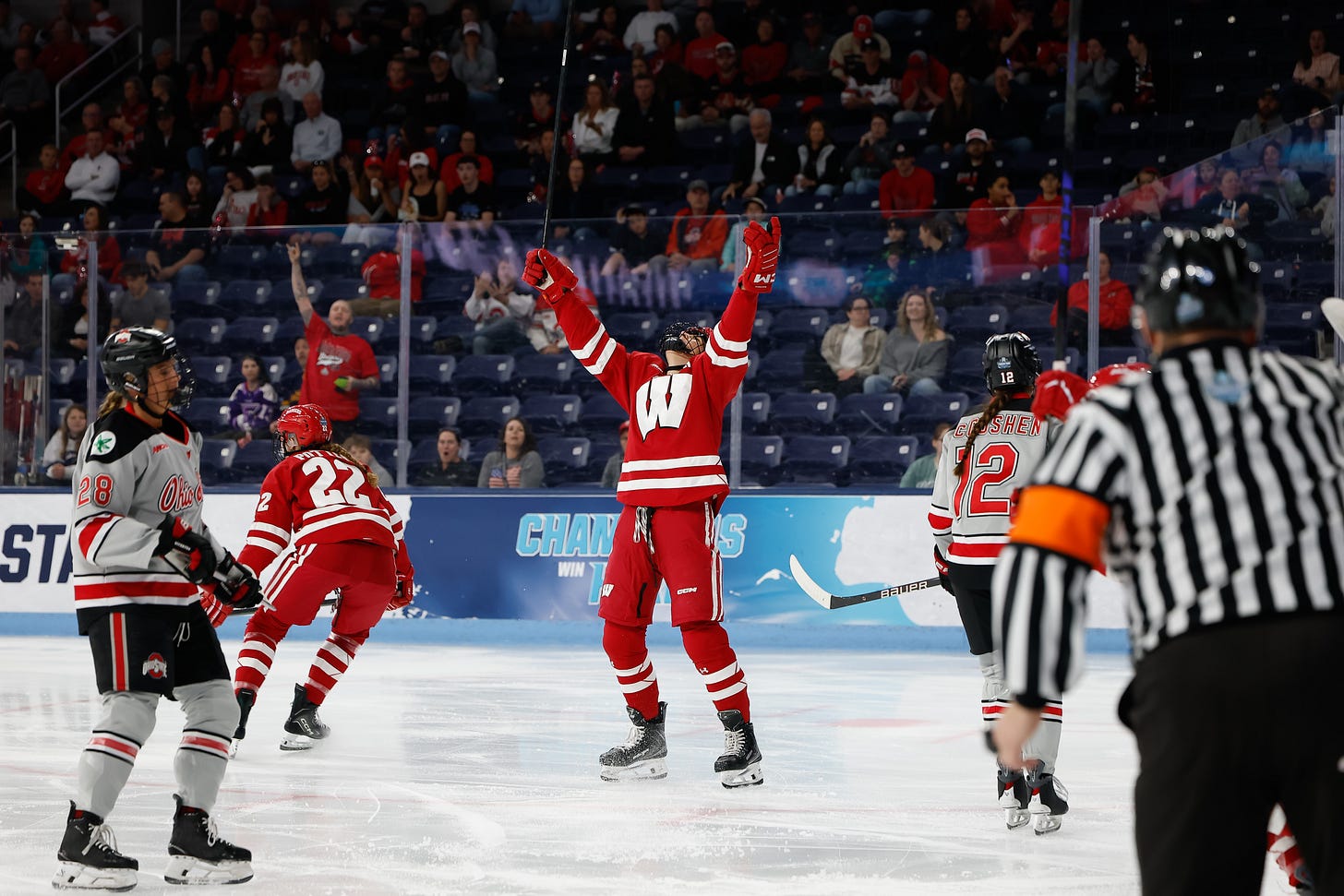 wisconsin women's hockey forward kelly gorbatenko lifts her hands in the air wisconsin women's hockey forward kelly gorbatenko lifts her hands in the air