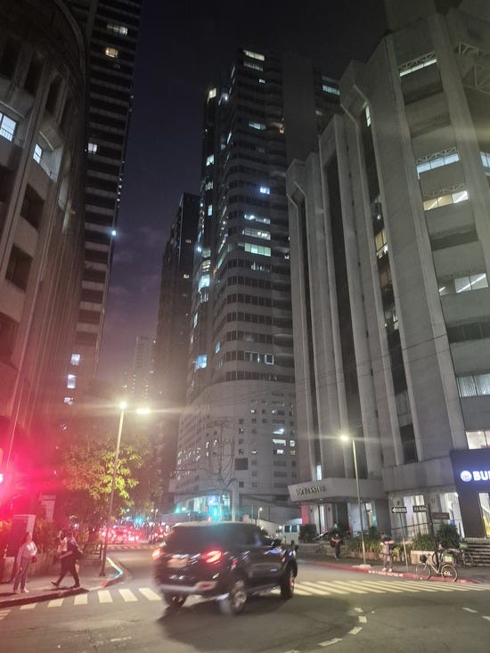 Shot of Salcedo Village at night