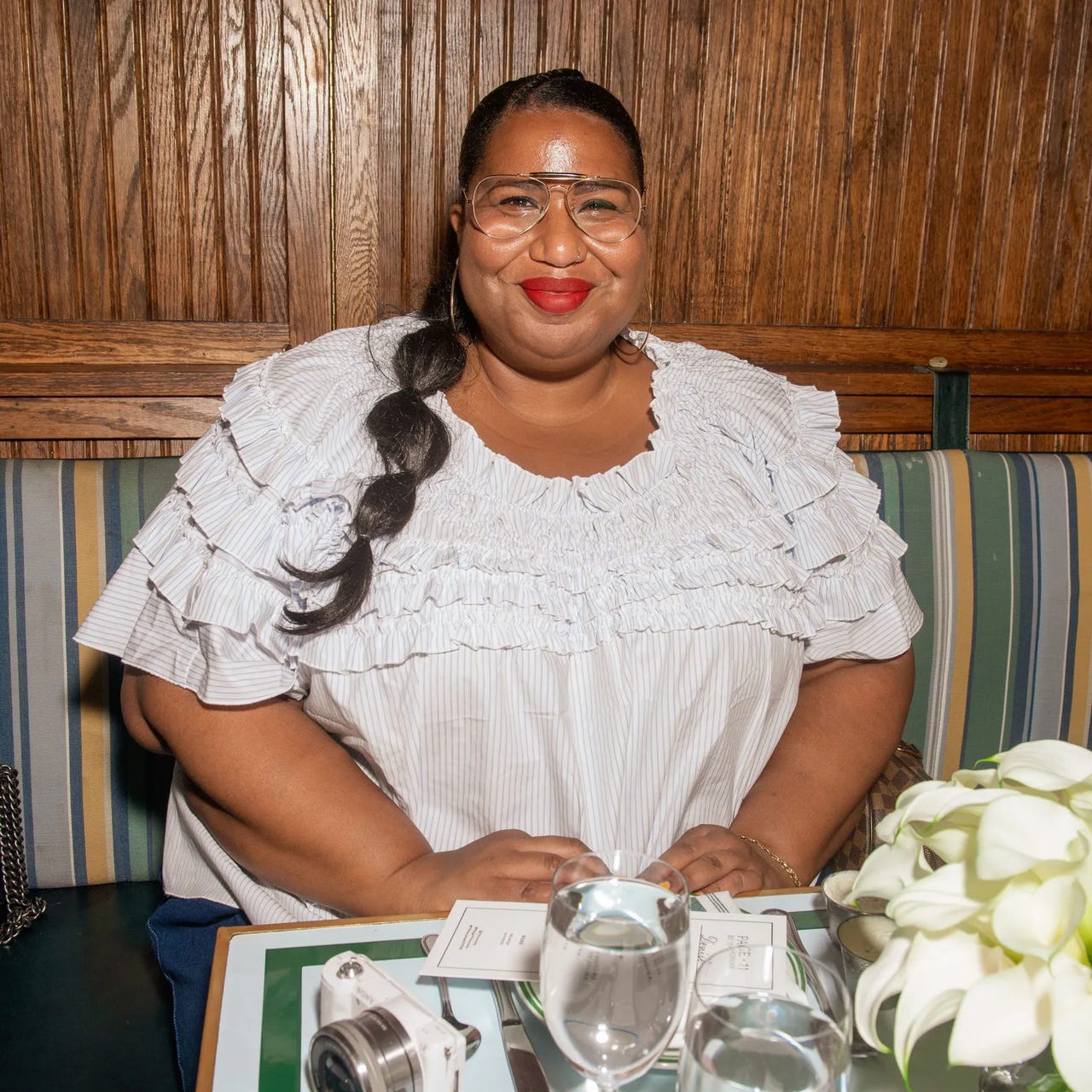 And I Get Dressed logo