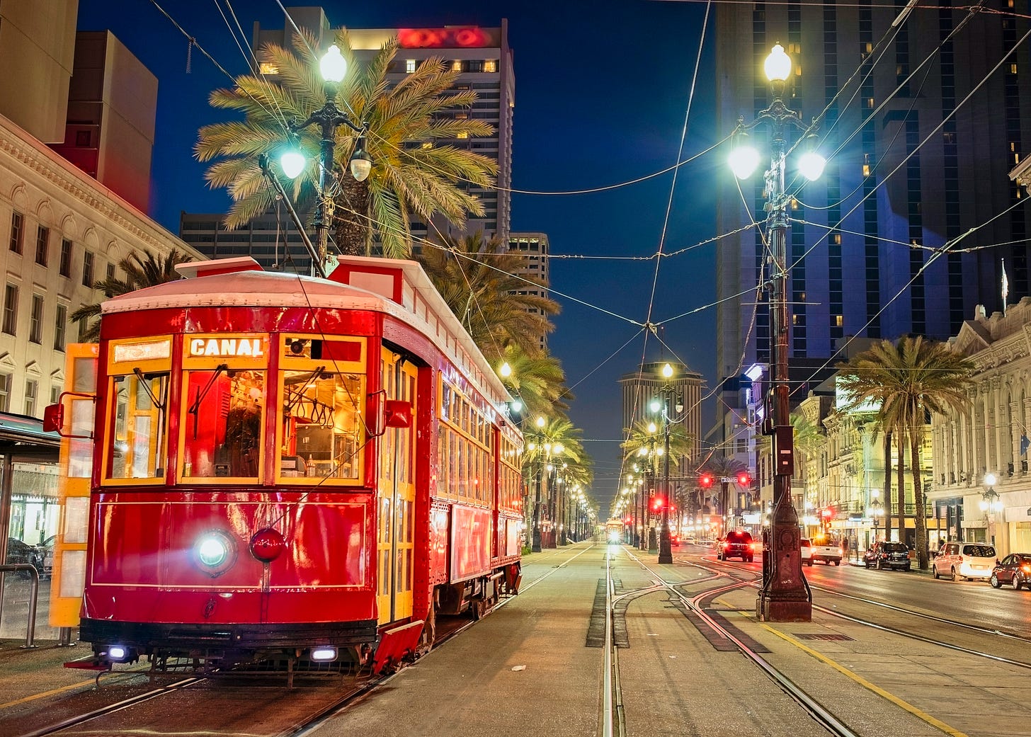 Photo of electrified trolley on rails in New Orleans Photo of electrified trolley on rails in New Orleans