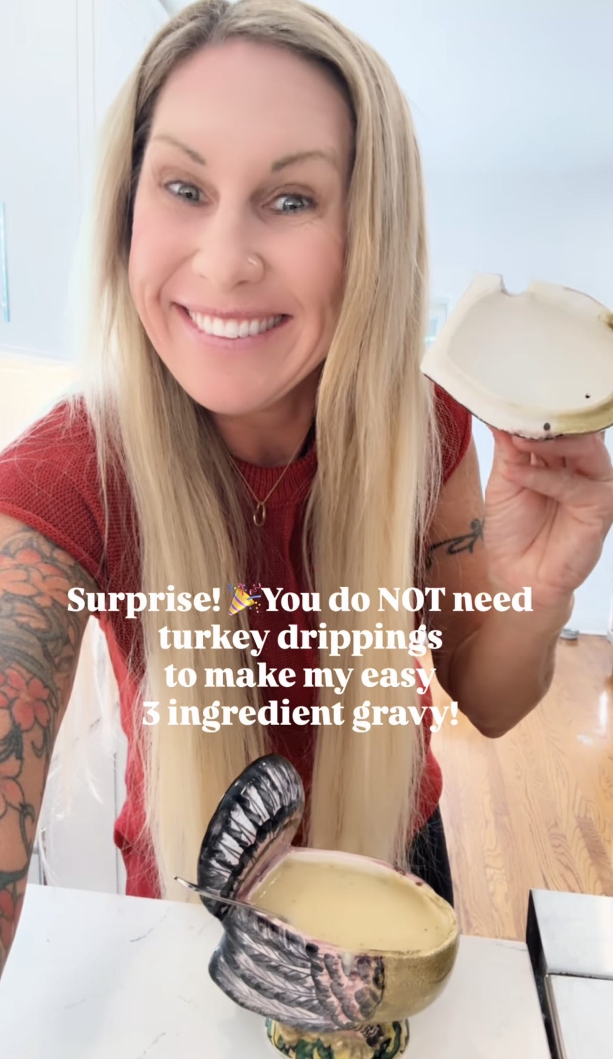 Woman smiling and holding a broken ceramic lid over a turkey-shaped dish; text overlay reads, "You do NOT need turkey drippings to make my easy 3 ingredient gravy!. Woman smiling and holding a broken ceramic lid over a turkey-shaped dish; text overlay reads, "You do NOT need turkey drippings to make my easy 3 ingredient gravy!.