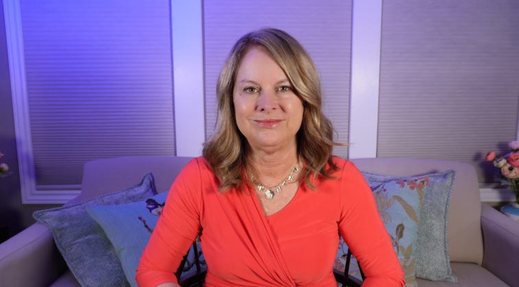 Teacher who challenged school board over gender books settles defamation case