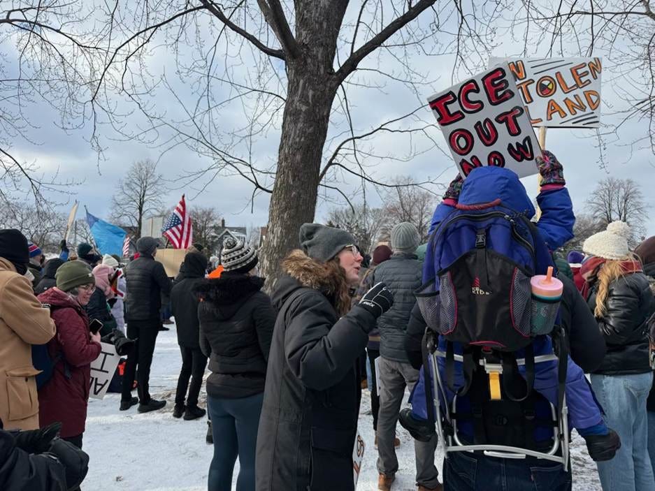 A group of people holding signs
AI-generated content may be incorrect. A group of people holding signs
AI-generated content may be incorrect.