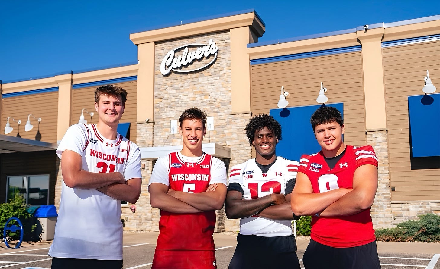 Wisconsin Badgers student-athletes Nolan Winter, Jack Janicki, Eugene Hilton Jr., and Mason Posa pose outside a Culver's restaurant during the announcement of the school's expanded partnership with Culver's. Wisconsin Badgers student-athletes Nolan Winter, Jack Janicki, Eugene Hilton Jr., and Mason Posa pose outside a Culver's restaurant during the announcement of the school's expanded partnership with Culver's.
