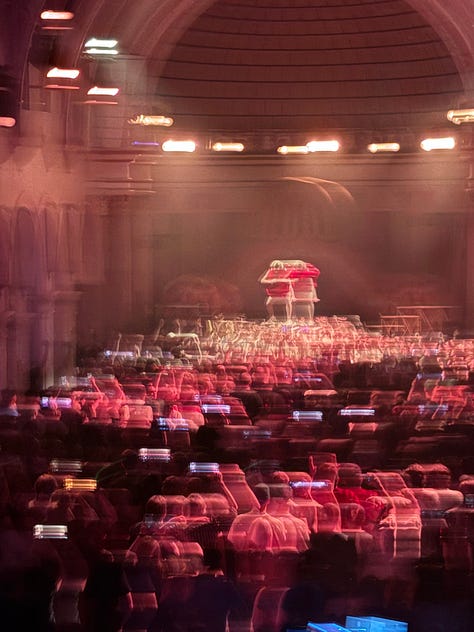 a crowd holding up a woman at La Rosa in Tucson