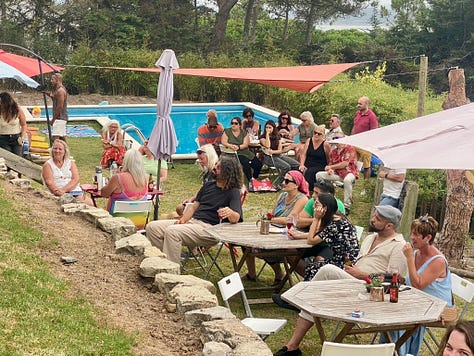 people outside having a party, playing live music and a swimming pool and bbq