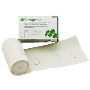 Setopress bandage with rectangles printed on the bandage to easily work out how much stretching is required to have the bandage applied correctly.