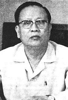 A person wearing glasses and a white shirt
Description automatically generated A person wearing glasses and a white shirt
Description automatically generated