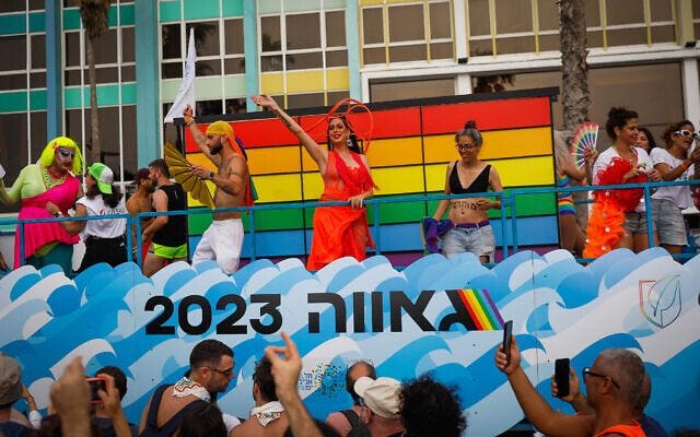 People participate in the 25th annual Tel Aviv Pride Parade on June 8, 2023. (Miriam Alster/Flash90)