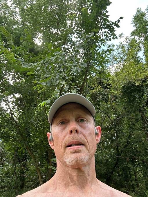 A person wearing a hat and earbuds

AI-generated content may be incorrect.