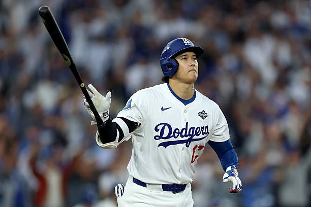 Shohei Ohtani of the Los Angeles Dodgers hits a home run against the Toronto Blue Jays during the third inning in game three of the 2025 World Series...
