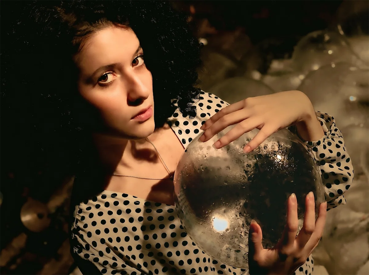 Artistic image of a woman in dramatic lighting, symbolizing the tension between setting boundaries vs enforcing control