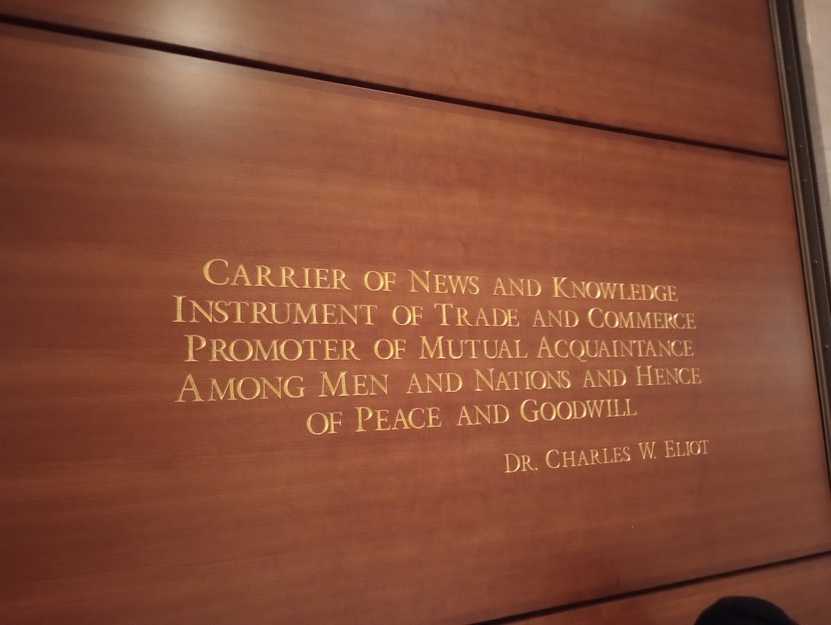 Quote on wood-paneled wall Quote on wood-paneled wall