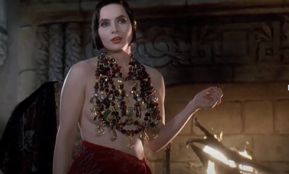 Isabelle Rossolini in Death Becomes Her, wearing that iconic shirt made of just a necklace; goddess she is gorgeous