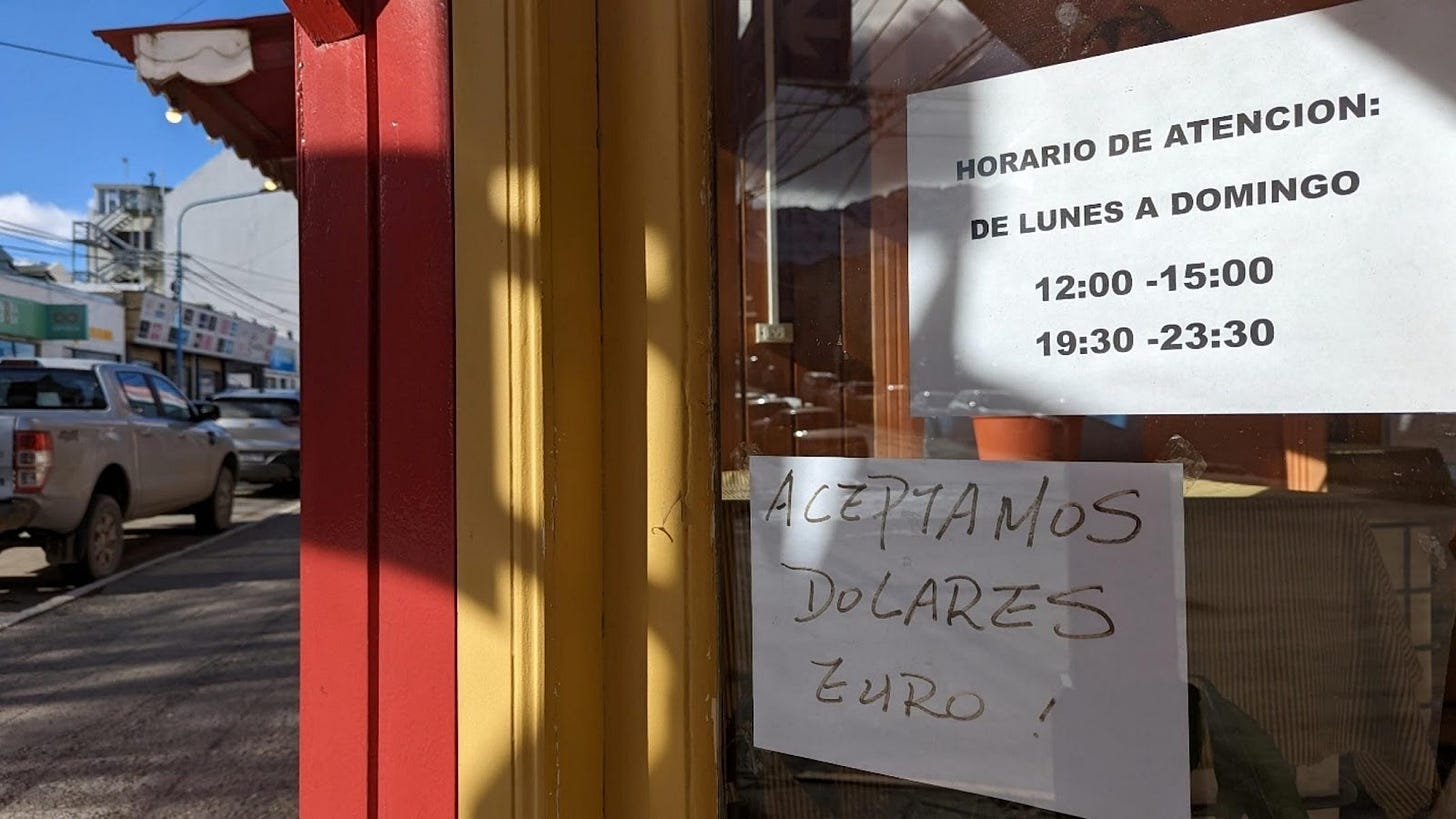 A sign on a window

Description automatically generated