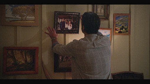 Walker Cordell fixing crooked picture and seeing a hidden camera watching them. Walker Cordell fixing crooked picture and seeing a hidden camera watching them.