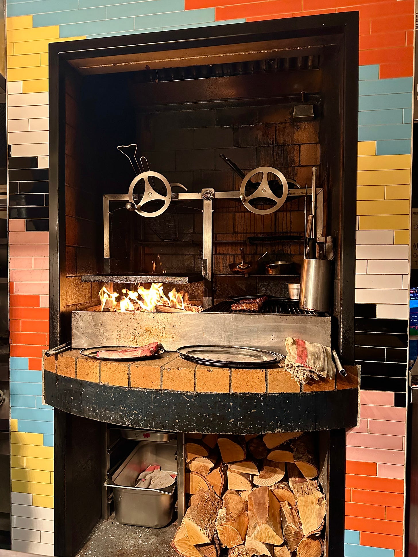 The open fire Ox grill at the centre of Elbow Lane