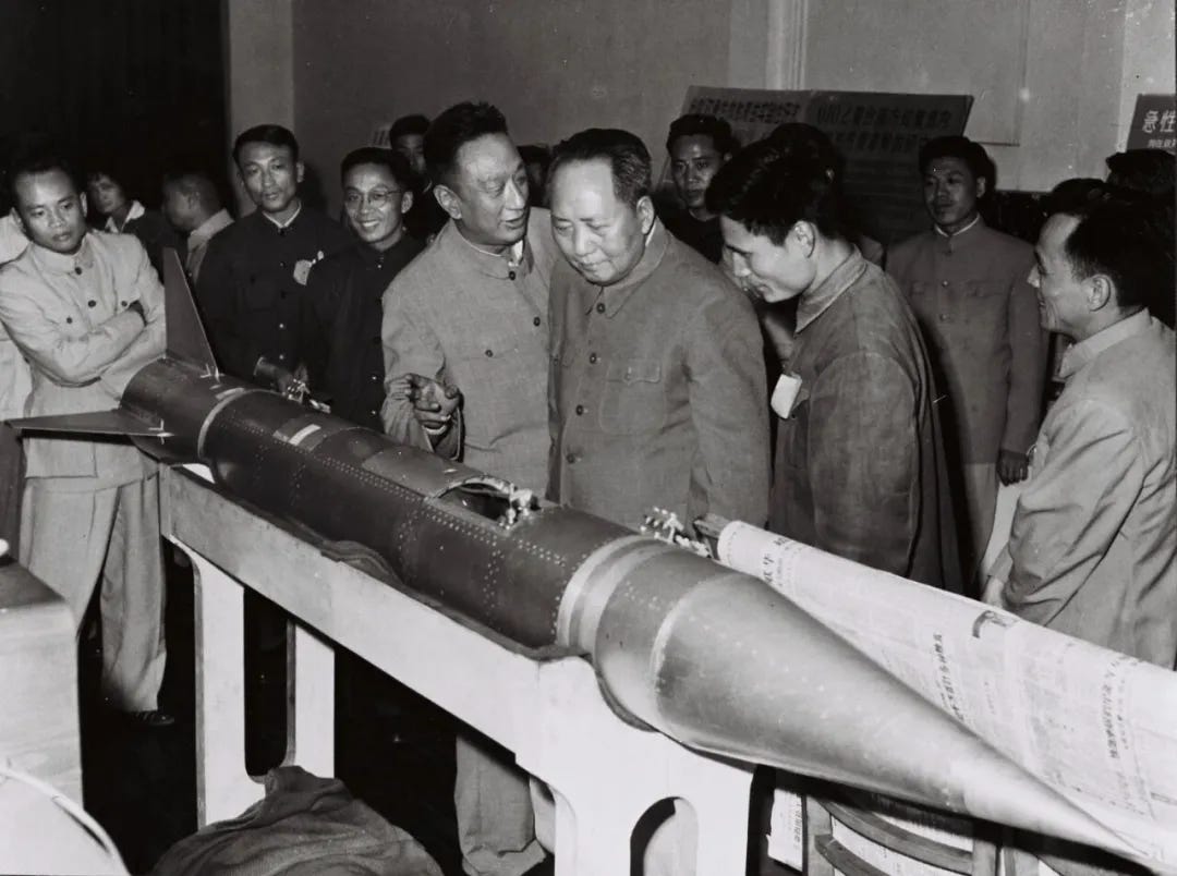 Chairman Mao Zedong inspecting the T-7M on display in Shanghai. Chairman Mao Zedong inspecting the T-7M on display in Shanghai.
