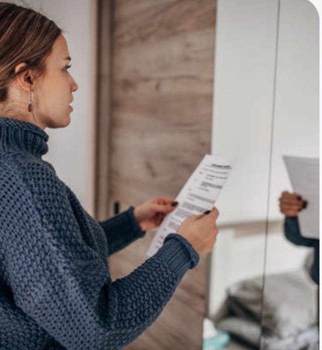a person practicing a speech in the mirror
